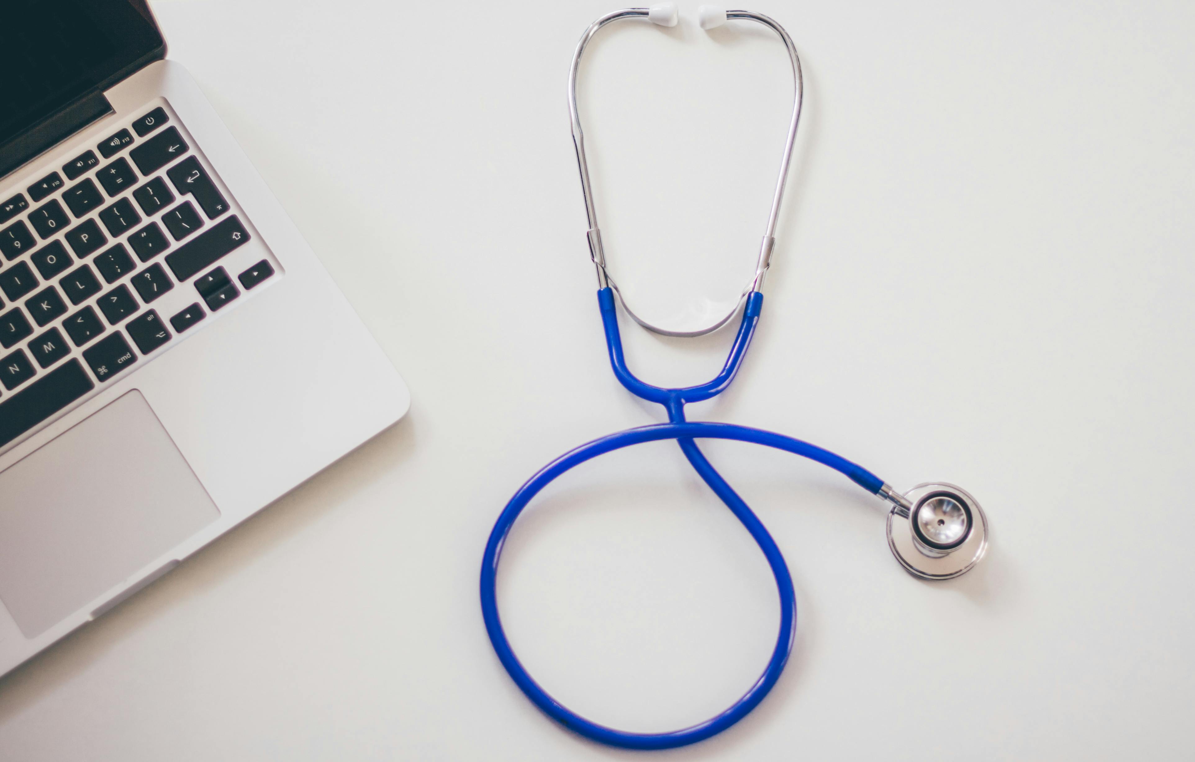 Digital health billing — stethoscope and laptop